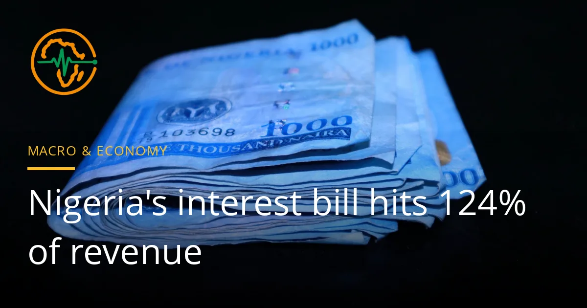Folded stack of Nigerian one-thousand naira notes under blue light on a dark table